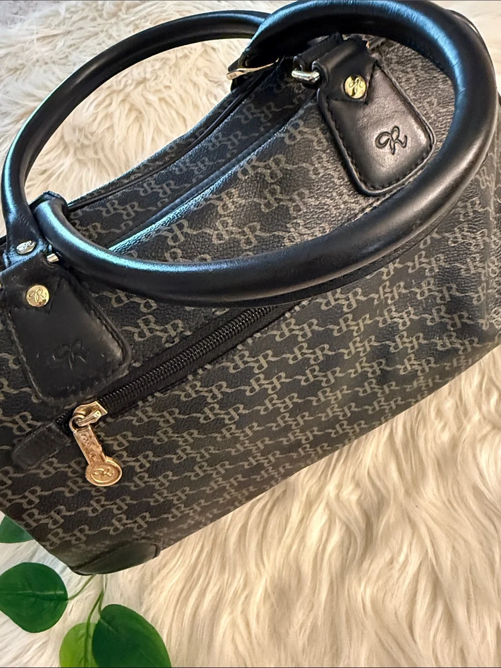 Rioni Signature Organizer Satchel featuring a black monogram 